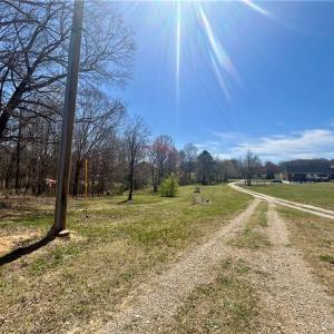 Split off driveway - Can add more Gravel and privacy trees if you wish!