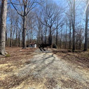 Camper or RV spot possible here! There are hookups from previous mobile home that was on site, it was removed years ago
