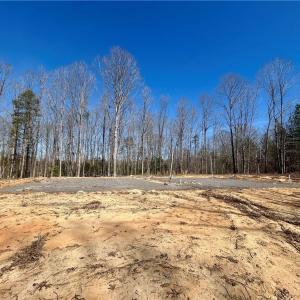 Cleared Home site with plumbing ran