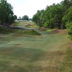 The view back up the 10th fairway of the famous Tot Hill Farm Wall hole.