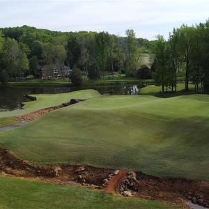 Imagine this is your back yard. Two of the most iconic holes at Tot Hill Farm with sunrises over the lake.