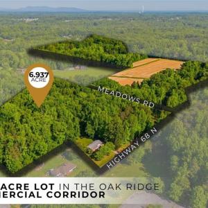 Prime dual-frontage opportunity! This 6.937-acre tract offers multiple access points and unbeatable positioning just a stone's throw from the Oak Ridge Town Park.