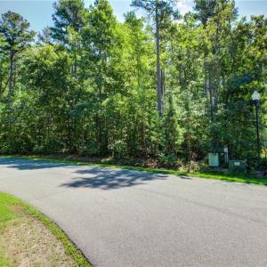 Road Frontage view #2 on Harborgate Dr corner lot.
