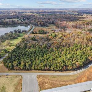 Aerial view of vacant land. Lot lines and dimensions are approximate.