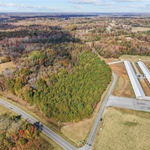 Aerial view of vacant land and farm land. Lot lines and dimensions are approximate.