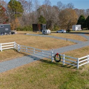 Tiny House/RV sites have septic hookup, electric, and garden space.