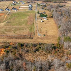 View from the back of the property. The white fence defines the property line while leaving open access for the pipeline easement