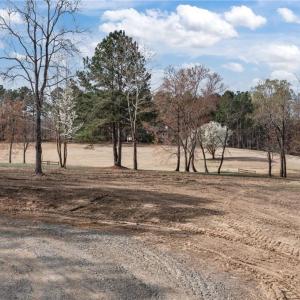 View of lot 54 and the 18th green and fairway in the background.