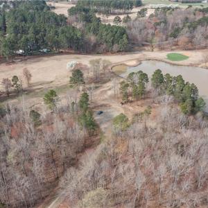 Aerial view of lot 54. Shows the 18th green and fairway in the upper portion of the photo.