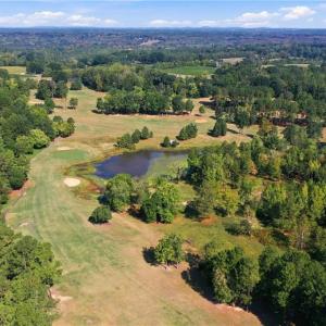 Aerial view of the lot 54 with the lake behind it.