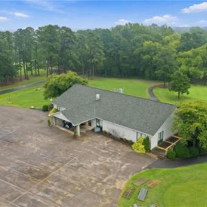 Another aerial view of the Clubhouse at Caswell Pines.