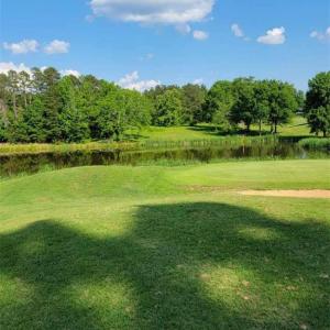 Seller photo of LOT 54 as seen just past the 18th green during the summer.