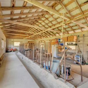 Concrete block milking parlor