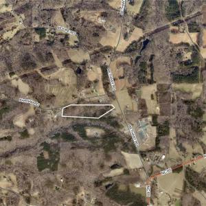 19.82 wooded acres with nearly 300 feet of road frontage
