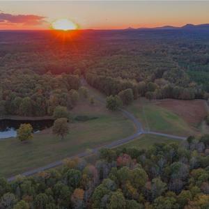 3 stocked fishing ponds, open pasture land, and wooded areas