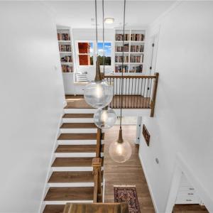 2 story foyer with decorative glass ball light fixtures