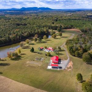 Custom built farm house w/ extensive Renovations (2020-2021) on 92 acres of private land