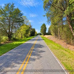 Paved Road Frontage Land Near Chapel Hill NC. Paved, state maintained road leading to the land. Easy year round access to wooded acreage in rural Orange County, NC, with power lines along the road.