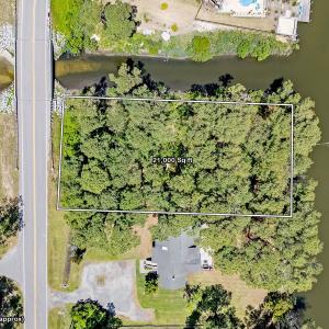 Photo #1 of 1144 Burnside Road, Manteo, NC 0.5 acres
