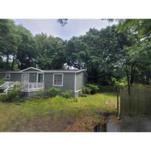 View of yard with a deck