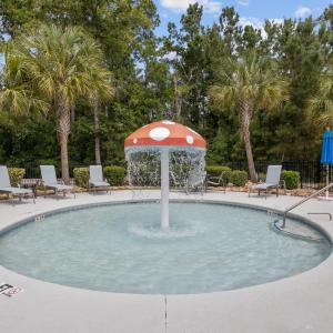 View of swimming pool with a patio area and pool w