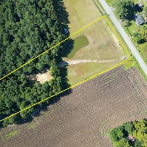 Aerial view of sparsely populated area with proper
