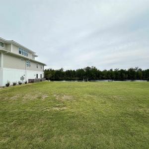 View of yard with a water view