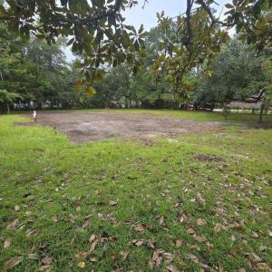 View of yard with a rural view