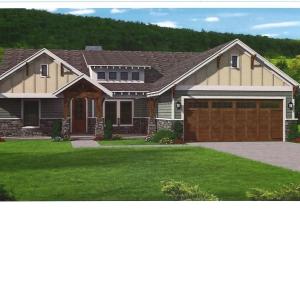 View of front of home with a front yard, a garage,