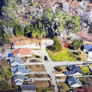Birds eye view of property featuring a residential