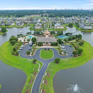 Aerial view of residential area with a nearby body