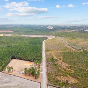 Birds eye view of property featuring a rural view