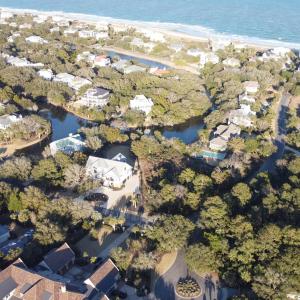 Aerial view featuring a water view and a view of t