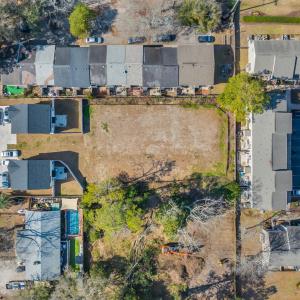Birds eye view of property with a residential view