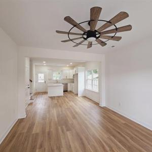 Unfurnished living room with light wood-type floor