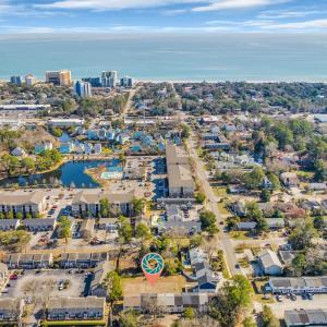 Birds eye view of property with a view of city and