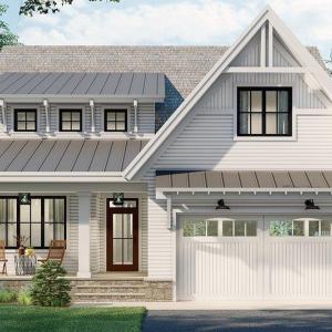 View of front facade featuring a standing seam roo