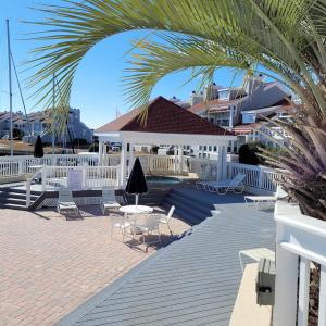 View of patio with fence