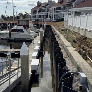 View of dock featuring a residential view and a wa