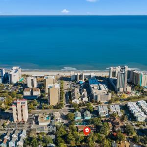 Bird's eye view with a water view and a view of ci