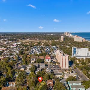 Birds eye view of property featuring a water view,