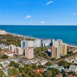 Birds eye view of property with a city view and a