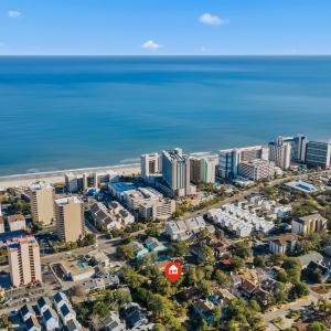 Drone / aerial view featuring a water view and a v