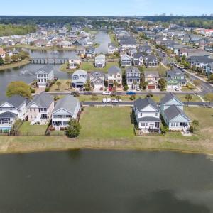Bird's eye view with a water view and a residentia