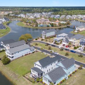 Bird's eye view with a water view and a residentia
