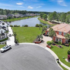 Bird's eye view with a water view and a residentia