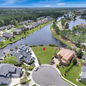 Drone / aerial view with a water view and a reside