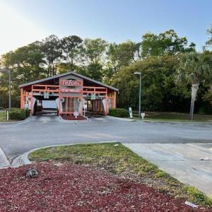 View of road with street lighting and driveway