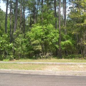 View of landscape featuring a forest view