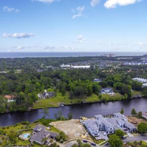 Drone / aerial view featuring a water view and a r